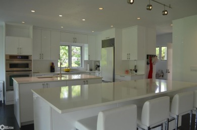 Luxuriously renovated mid-century modern home, open floor plan on Ottumwa Country Club in Iowa - for sale on GolfHomes.com, golf home, golf lot