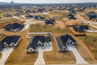 Build your dream home on this exceptional half acre lot nestled on Pecan Plantation Country Club in Texas - for sale on GolfHomes.com, golf home, golf lot