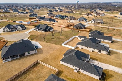 Build your dream home on this exceptional half acre lot nestled on Pecan Plantation Country Club in Texas - for sale on GolfHomes.com, golf home, golf lot