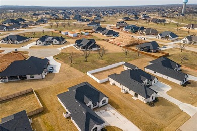 Build your dream home on this exceptional half acre lot nestled on Pecan Plantation Country Club in Texas - for sale on GolfHomes.com, golf home, golf lot