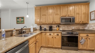 Experience lakefront luxury in the prestigious, gated community on The Club At Old Kinderhook in Missouri - for sale on GolfHomes.com, golf home, golf lot