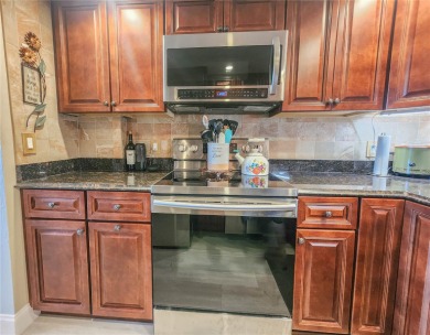 Stylish, updated condo steps from the beach on A1A in Flagler on Ocean Palm Golf Course in Florida - for sale on GolfHomes.com, golf home, golf lot