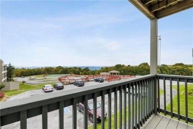 Enjoy LONG RANGE VIEWS from this VERY AFFORDABLE turnkey unit on Beech Mountain Club in North Carolina - for sale on GolfHomes.com, golf home, golf lot