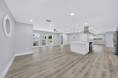 Beautifully Renovated Waterfront Oasis Now Available in on Whiskey Creek Country Club in Florida - for sale on GolfHomes.com, golf home, golf lot