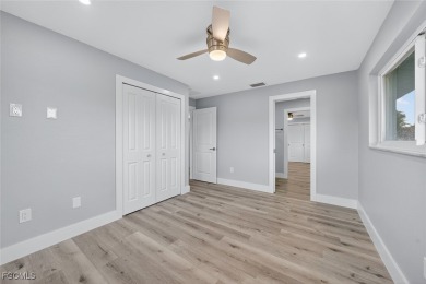 Beautifully Renovated Waterfront Oasis Now Available in on Whiskey Creek Country Club in Florida - for sale on GolfHomes.com, golf home, golf lot