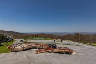 Enjoy LONG RANGE VIEWS from this VERY AFFORDABLE turnkey unit on Beech Mountain Club in North Carolina - for sale on GolfHomes.com, golf home, golf lot