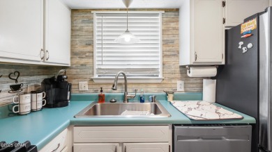 Resort-Style Townhouse with Ensuite Bedrooms, Sunroom & Prime on Edgewater Beach Resort in Florida - for sale on GolfHomes.com, golf home, golf lot