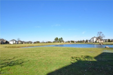 Enjoy beautiful sunsets over the eighth fairway and wildlife on on Fox Meadow Country Club in Ohio - for sale on GolfHomes.com, golf home, golf lot