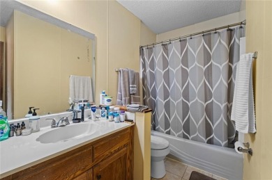 Welcome to this 2-bedroom, 1.5 bath townhouse in the heart of on Bella Vista Country Club and Golf Course in Arkansas - for sale on GolfHomes.com, golf home, golf lot