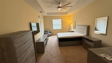 Welcome to your dream home in ChampionsGate - one of Orlando's on The Oasis Club at Champions Gate in Florida - for sale on GolfHomes.com, golf home, golf lot
