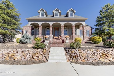 Discover refined living in this spacious 4-bedroom, 4-bath on Prescott Lakes Golf and Country Club in Arizona - for sale on GolfHomes.com, golf home, golf lot