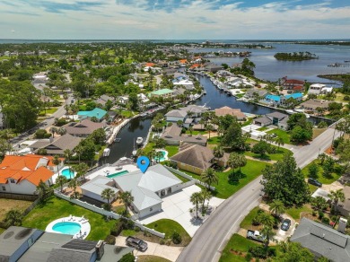 Canal-front home in Bay Point gated community. Gulf Access on Bay Point Resort Golf Club in Florida - for sale on GolfHomes.com, golf home, golf lot