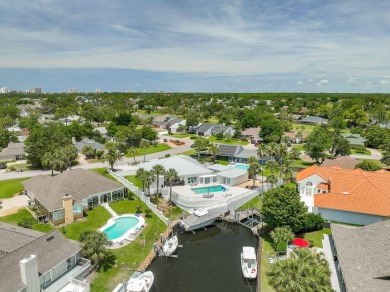 Canal-front home in Bay Point gated community. Gulf Access on Bay Point Resort Golf Club in Florida - for sale on GolfHomes.com, golf home, golf lot