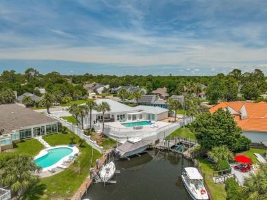 Canal-front home in Bay Point gated community. Gulf Access on Bay Point Resort Golf Club in Florida - for sale on GolfHomes.com, golf home, golf lot