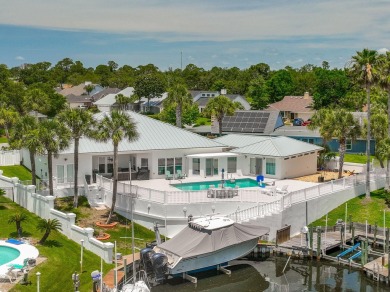 Canal-front home in Bay Point gated community. Gulf Access on Bay Point Resort Golf Club in Florida - for sale on GolfHomes.com, golf home, golf lot