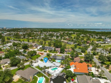 Canal-front home in Bay Point gated community. Gulf Access on Bay Point Resort Golf Club in Florida - for sale on GolfHomes.com, golf home, golf lot