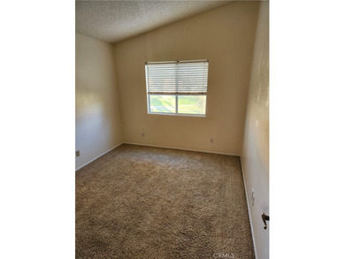 Just imagine yourself with your favorite beverage and setting on Sun Lakes Country Club in California - for sale on GolfHomes.com, golf home, golf lot