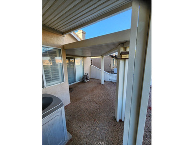 Just imagine yourself with your favorite beverage and setting on Sun Lakes Country Club in California - for sale on GolfHomes.com, golf home, golf lot