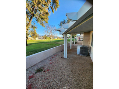 Just imagine yourself with your favorite beverage and setting on Sun Lakes Country Club in California - for sale on GolfHomes.com, golf home, golf lot