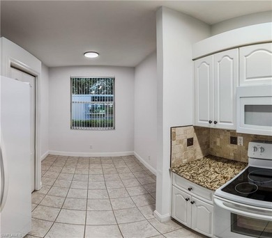 This sunfilled 2 bed, 2 bath 1st floor condo backing to the 8th on Villages of Country Creek Golf Course in Florida - for sale on GolfHomes.com, golf home, golf lot