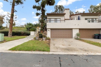 Welcome to 26562 Guadiana, a charming end-unit townhome nestled on Mission Viejo Country Club in California - for sale on GolfHomes.com, golf home, golf lot