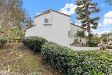 Welcome to 26562 Guadiana, a charming end-unit townhome nestled on Mission Viejo Country Club in California - for sale on GolfHomes.com, golf home, golf lot