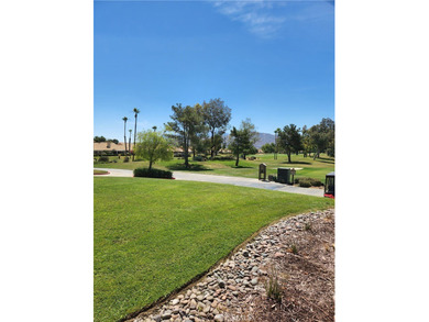 Just imagine yourself with your favorite beverage and setting on Sun Lakes Country Club in California - for sale on GolfHomes.com, golf home, golf lot