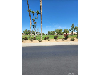 Just imagine yourself with your favorite beverage and setting on Sun Lakes Country Club in California - for sale on GolfHomes.com, golf home, golf lot