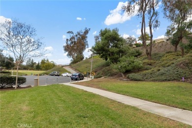 Welcome to 26562 Guadiana, a charming end-unit townhome nestled on Mission Viejo Country Club in California - for sale on GolfHomes.com, golf home, golf lot