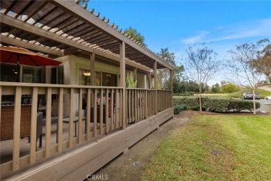 Welcome to 26562 Guadiana, a charming end-unit townhome nestled on Mission Viejo Country Club in California - for sale on GolfHomes.com, golf home, golf lot