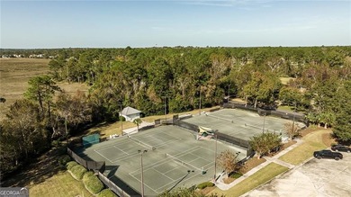 Welcome to 235 Cardinal Circle West-where refined comfort meets on The Club At Osprey Cove in Georgia - for sale on GolfHomes.com, golf home, golf lot