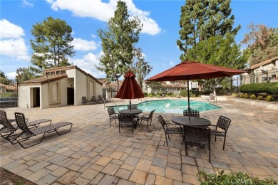 Welcome to 26562 Guadiana, a charming end-unit townhome nestled on Mission Viejo Country Club in California - for sale on GolfHomes.com, golf home, golf lot