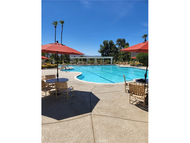 Just imagine yourself with your favorite beverage and setting on Sun Lakes Country Club in California - for sale on GolfHomes.com, golf home, golf lot