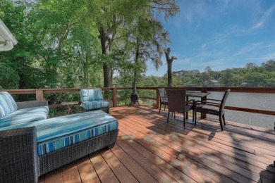 Welcome to a tranquil waterfront retreat nestled in the trees in on Hide-A-Way Lake Golf Course in Texas - for sale on GolfHomes.com, golf home, golf lot