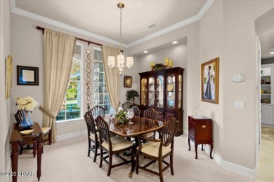 Step into elegance with this meticulously maintained residence on Plantation Bay Golf and Country Club in Florida - for sale on GolfHomes.com, golf home, golf lot