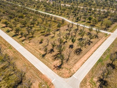 Beautiful 1.5 acre corner lot located in the highly sought after on Pecan Plantation Country Club in Texas - for sale on GolfHomes.com, golf home, golf lot
