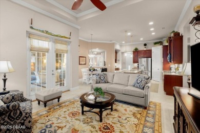 Step into elegance with this meticulously maintained residence on Plantation Bay Golf and Country Club in Florida - for sale on GolfHomes.com, golf home, golf lot