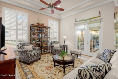 Step into elegance with this meticulously maintained residence on Plantation Bay Golf and Country Club in Florida - for sale on GolfHomes.com, golf home, golf lot