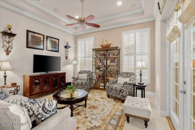 Step into elegance with this meticulously maintained residence on Plantation Bay Golf and Country Club in Florida - for sale on GolfHomes.com, golf home, golf lot