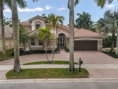 A rated schools. Exquisite, completely renovated and upgraded on Weston Hills Country Club in Florida - for sale on GolfHomes.com, golf home, golf lot