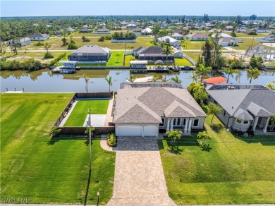 Experience the pinnacle of WATERFRONT LUXURY LIVING in this on Burnt Store Golf Club in Florida - for sale on GolfHomes.com, golf home, golf lot