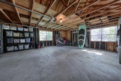 Welcome to a tranquil waterfront retreat nestled in the trees in on Hide-A-Way Lake Golf Course in Texas - for sale on GolfHomes.com, golf home, golf lot