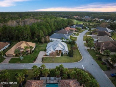 Step into elegance with this meticulously maintained residence on Plantation Bay Golf and Country Club in Florida - for sale on GolfHomes.com, golf home, golf lot