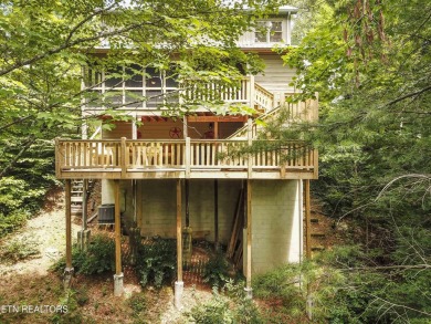 Make this adorable cabin your getaway to the Great Smoky on Laurel Valley Golf Course in Tennessee - for sale on GolfHomes.com, golf home, golf lot