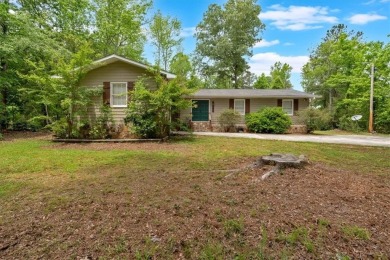 Discover this charming 3-bedroom, 2-bath ranch-style home on Fairfield Plantation Golf and Country Club in Georgia - for sale on GolfHomes.com, golf home, golf lot