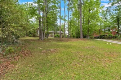 Discover this charming 3-bedroom, 2-bath ranch-style home on Fairfield Plantation Golf and Country Club in Georgia - for sale on GolfHomes.com, golf home, golf lot