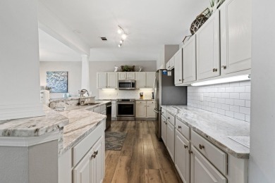 Located front and center to one of Sandestin's beautiful lakes on Sandestin Golf and Beach Resort - Raven in Florida - for sale on GolfHomes.com, golf home, golf lot