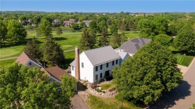 Located on a highly desirable lot overlooking Prestwick Golf on Prestwick Golf Club At Wedgewood in Minnesota - for sale on GolfHomes.com, golf home, golf lot