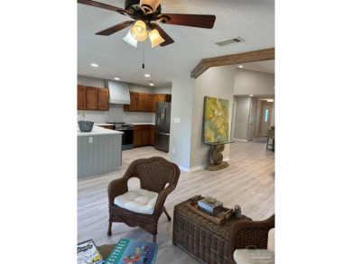 Desirable Victorian Village, immaculate updated-remodeled home on Tiger Point Golf and Country Club in Florida - for sale on GolfHomes.com, golf home, golf lot