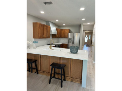 Desirable Victorian Village, immaculate updated-remodeled home on Tiger Point Golf and Country Club in Florida - for sale on GolfHomes.com, golf home, golf lot